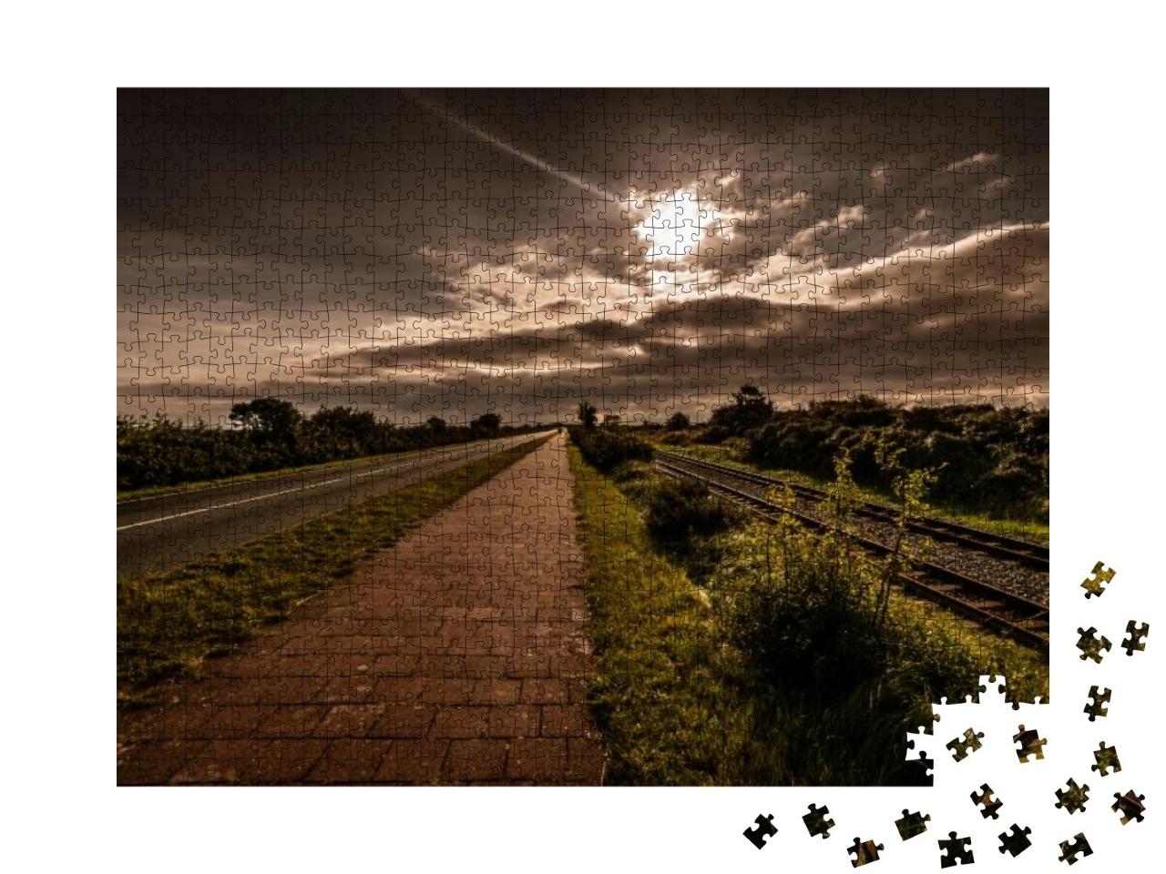 A Scenic View of Railroad Near the Highway During Sunset... Jigsaw Puzzle with 1000 pieces