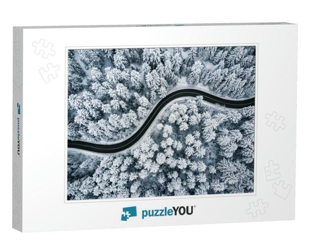Curvy Windy Road in Snow Covered Forest, Top Down Aerial... Jigsaw Puzzle