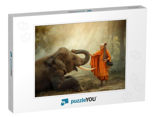 Monk Walking Hiking with Canny Elephant in Forest... Jigsaw Puzzle