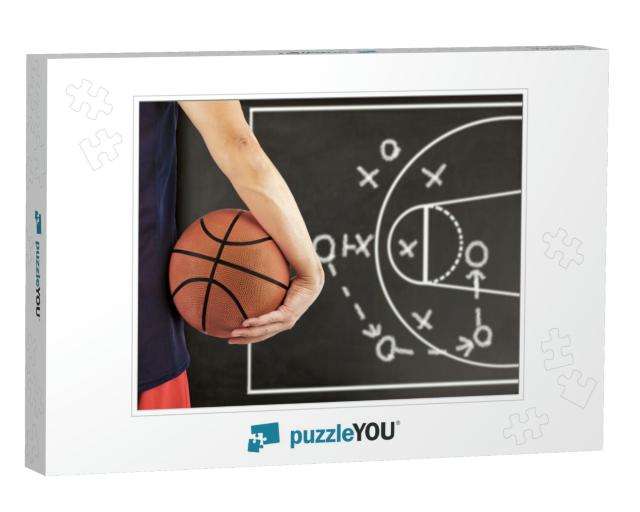 Cropped Image of a Young Man Holding a Basketball Ball wi... Jigsaw Puzzle