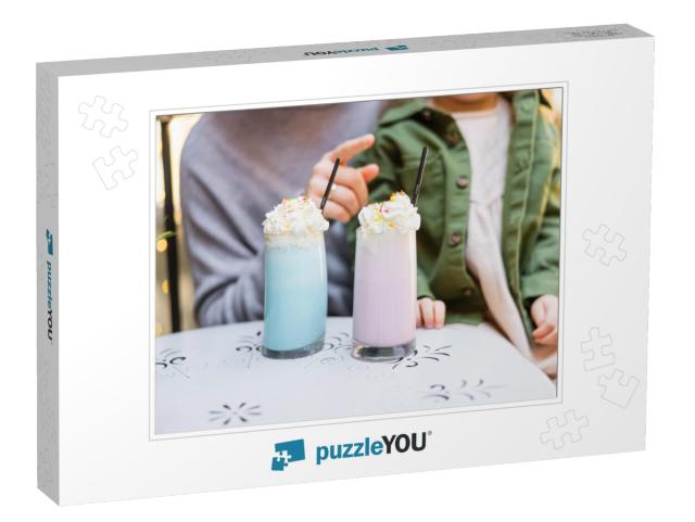 cropped view of woman pointing at glasses with mil Jigsaw Puzzle