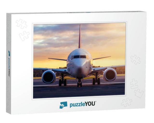 Sunset View of Airplane on Airport Runway Under Dramatic... Jigsaw Puzzle