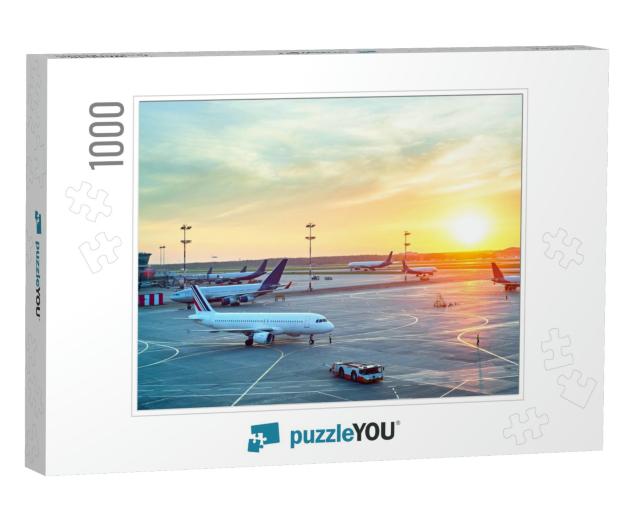 Airport with Many Airplanes At Beautiful Sunset... Jigsaw Puzzle with 1000 pieces