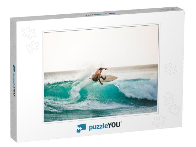 Professional Surfer Riding Waves in Bali, Indonesia. Men... Jigsaw Puzzle