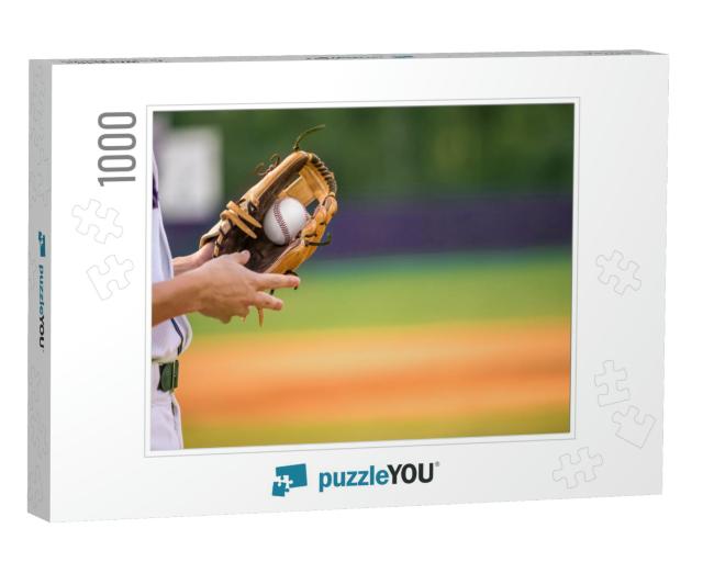 A Young Adult Male Baseball Player Holding a Baseball Glo... Jigsaw Puzzle with 1000 pieces