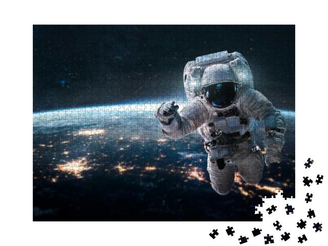 Astronaut in Outer Space Over of the Nightly Earth. City... Jigsaw Puzzle with 1000 pieces