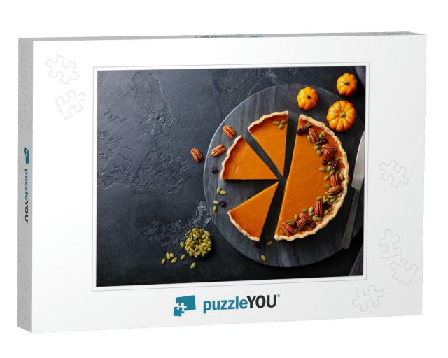 Pumpkin Pie on Marble Cutting Board. Dark Background. Cop... Jigsaw Puzzle
