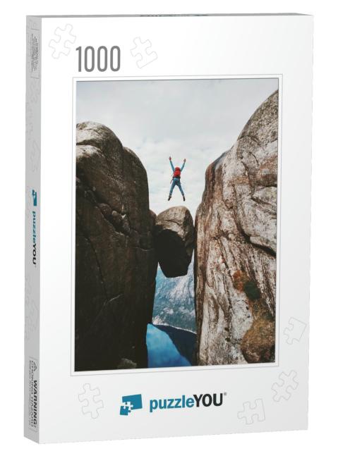 Man Jumping Over Kjeragbolten Travel in Norway Kjerag Mou... Jigsaw Puzzle with 1000 pieces