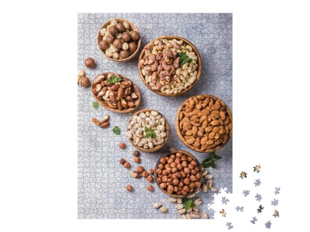 Assortment of Nuts in a Wooden Bowls, on a Gray Backgroun... Jigsaw Puzzle with 1000 pieces