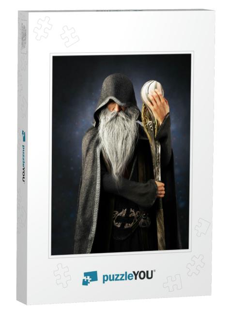 Evil Warlock Old Hooded Wizard Posing with Staff on a Blu... Jigsaw Puzzle