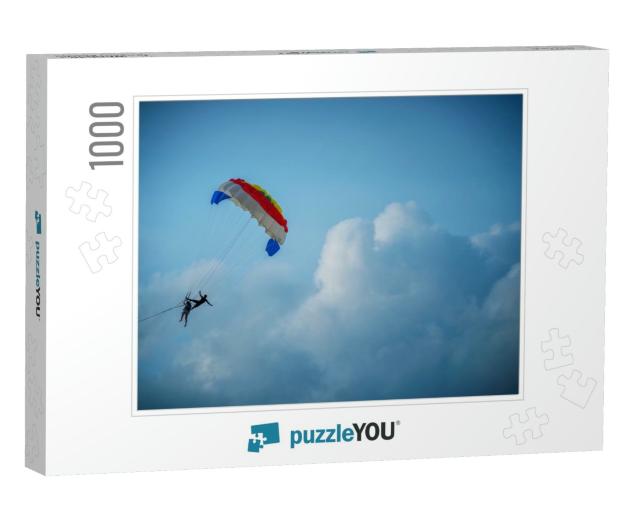 Two Tourists Are Playing the Parasailing in the Sky Durin... Jigsaw Puzzle with 1000 pieces