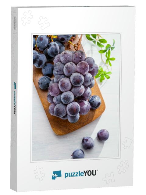 Fresh Grapes on Wooden Table... Jigsaw Puzzle