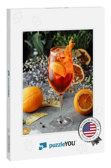 Aperol Spritz Cocktail on a Gray Concrete Background. a G... Jigsaw Puzzle