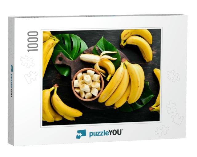 Bananas on a Black Wooden Surface. Tropical Fruits. Top V... Jigsaw Puzzle with 1000 pieces