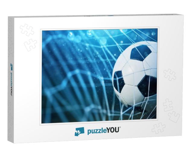 Soccer ball in goal on blue background Jigsaw Puzzle