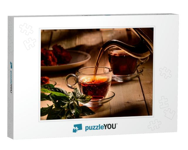 Hot Steaming Black Tea in a Cup on a Rustic Background... Jigsaw Puzzle