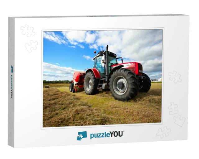 Huge Tractor Collecting Haystack in the Field in a Nice B... Jigsaw Puzzle