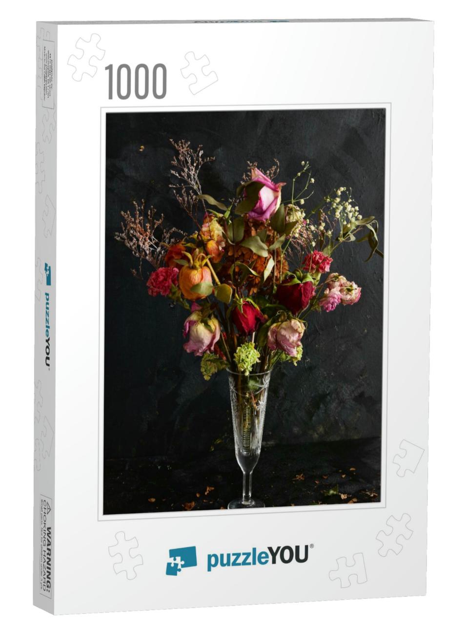 A Bouquet of Dried Flowers in a Crystal Vase Against a Bl... Jigsaw Puzzle with 1000 pieces