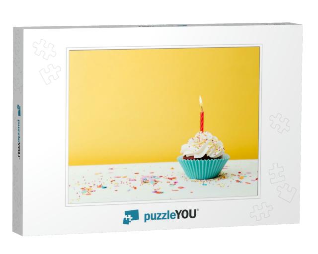 A Colorful Birthday Cupcake with One Candle & Confetti on... Jigsaw Puzzle