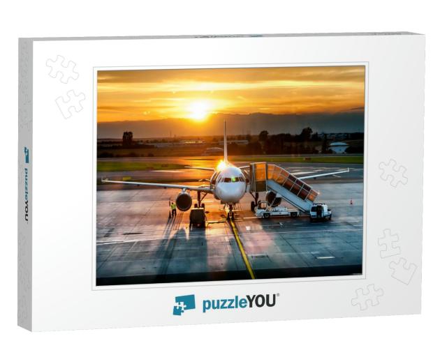 Passenger Airplane on Runway Near the Terminal in an Airp... Jigsaw Puzzle