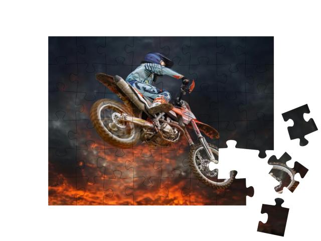 Jumping Motocross Rider with Firestorm in the Background... Jigsaw Puzzle with 48 pieces