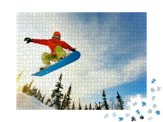 Snowboarder Jumping Through Air with Deep Blue Sky in Bac... Jigsaw Puzzle with 1000 pieces