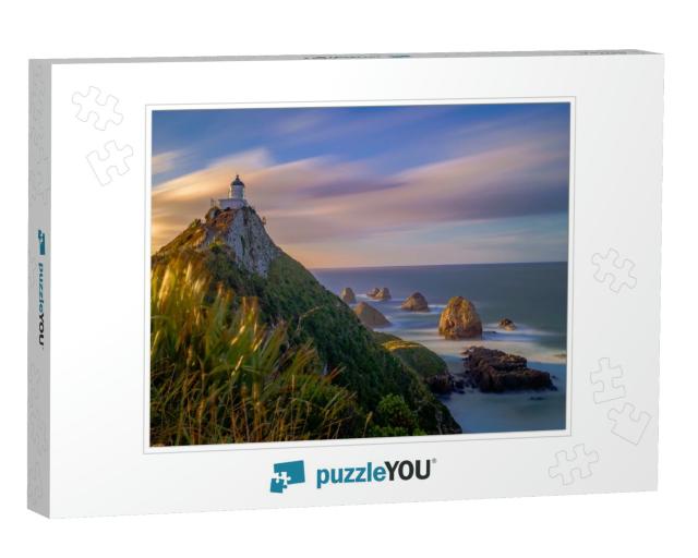 Stream of Clouds Passing Over the Nugget Point Lighthouse... Jigsaw Puzzle