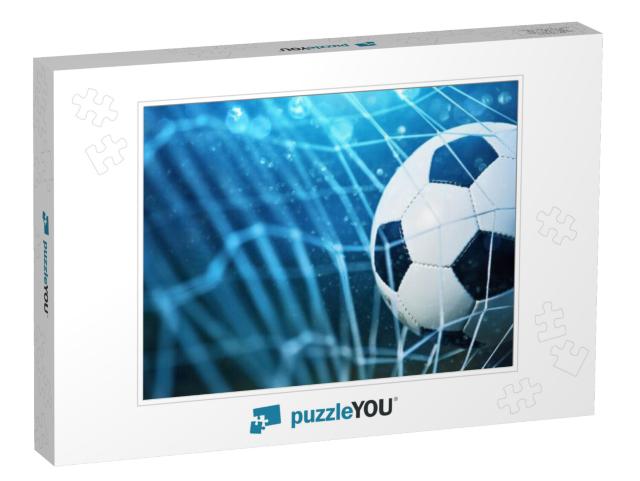 Soccer ball in goal on blue background Jigsaw Puzzle