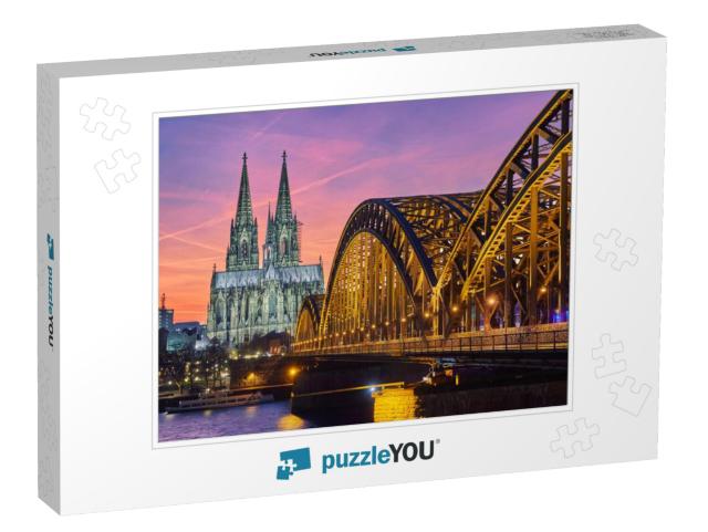 Cologne Cathedral & Hohenzollern Bridge At Sunset / Night... Jigsaw Puzzle