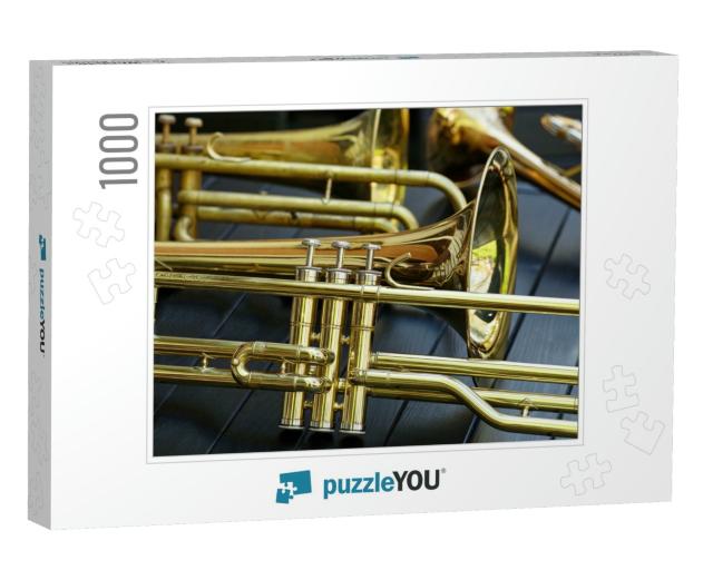 A Close-Up of a Brass Cornet or Trumpet Lies on a Boot in... Jigsaw Puzzle with 1000 pieces