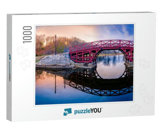 Arching Pink Wooden Bridge & Reflections Over the Pond At... Jigsaw Puzzle with 1000 pieces
