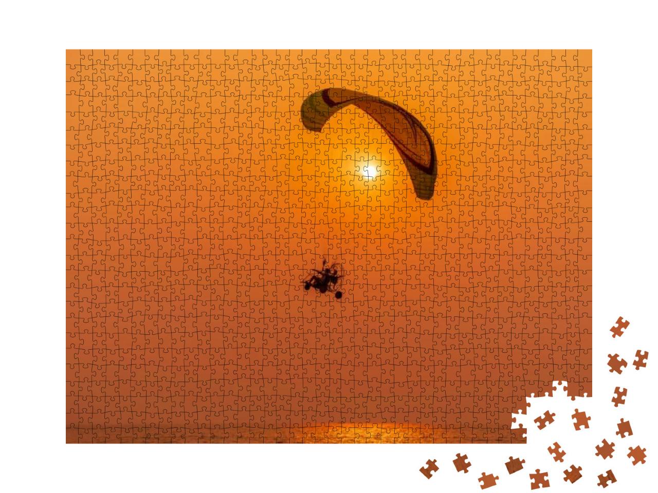 Silhouette of the Sport Paramotor Control Flying Through... Jigsaw Puzzle with 1000 pieces