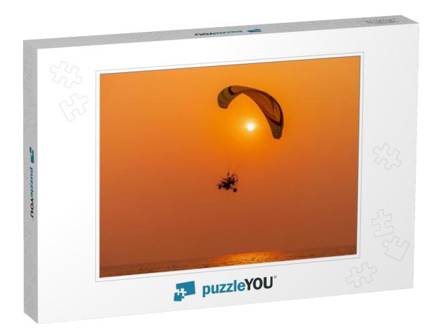 Silhouette of the Sport Paramotor Control Flying Through... Jigsaw Puzzle