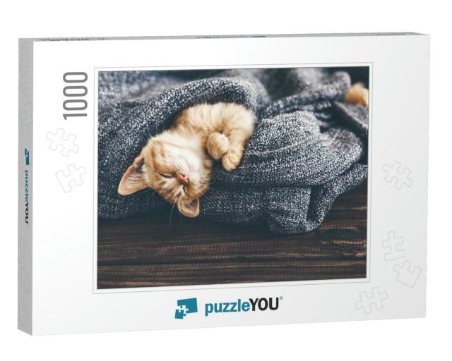 Cute Little Ginger Kitten is Sleeping in Soft Blanket on... Jigsaw Puzzle with 1000 pieces
