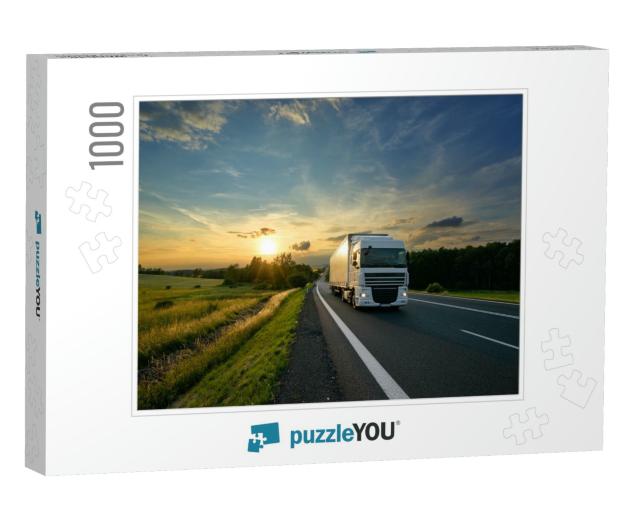 White Truck Driving on the Asphalt Road in Rural Landscap... Jigsaw Puzzle with 1000 pieces