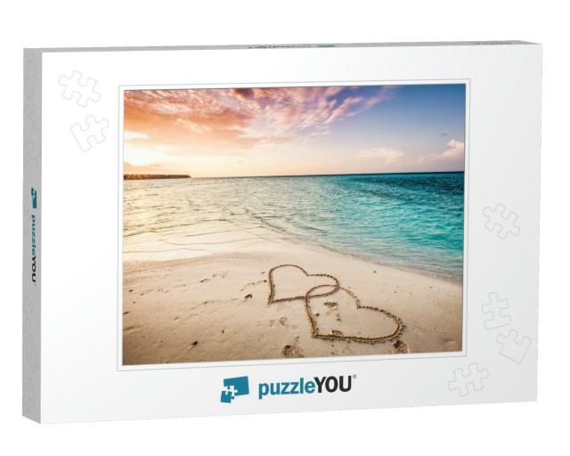 Two Hearts Drawn on a Sandy Beach by the Sea. Sunset View... Jigsaw Puzzle