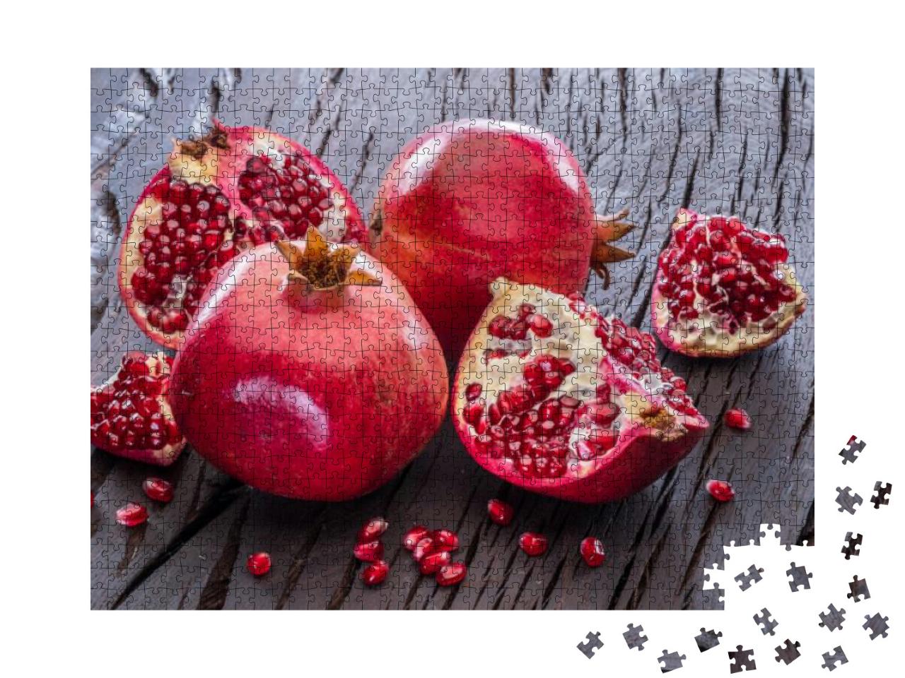 Ripe Pomegranate Fruits on the Wooden Background... Jigsaw Puzzle with 1000 pieces