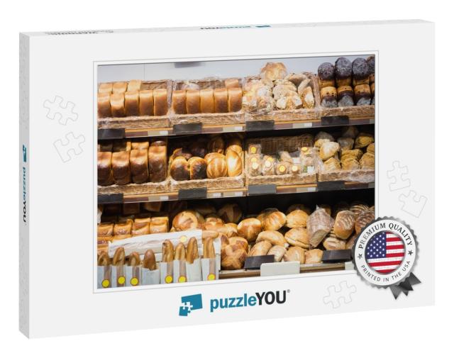 Focus on Shelves with Bread in a Supermarket... Jigsaw Puzzle