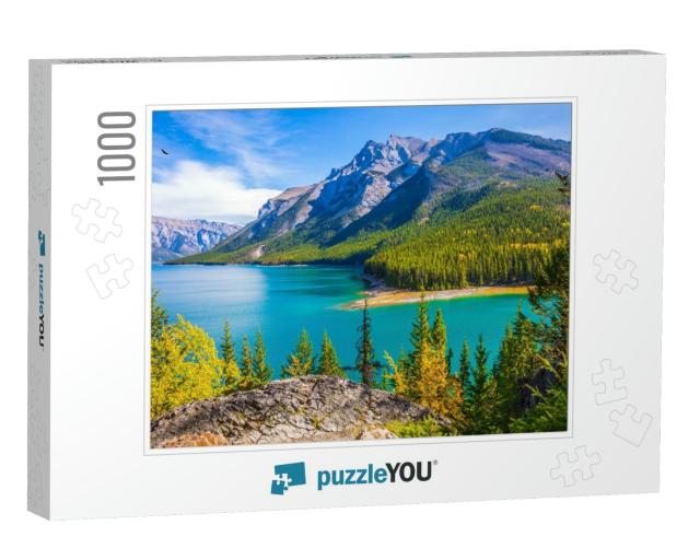 The Lake with Turquoise Water is Surrounded by Coniferous... Jigsaw Puzzle with 1000 pieces