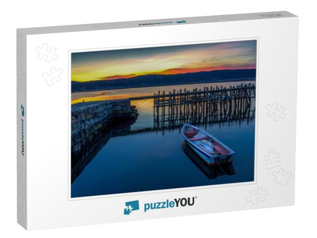 A Small White Boat Docked in the Port... Jigsaw Puzzle