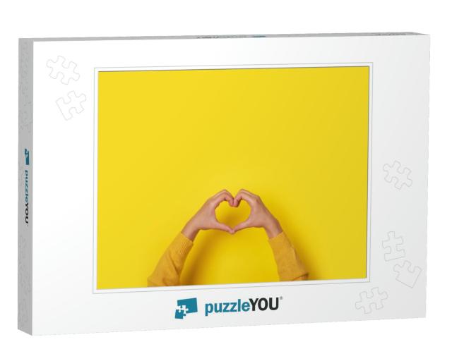 Hands Making Heart Shape, Love Symbol Over Yellow Backgro... Jigsaw Puzzle
