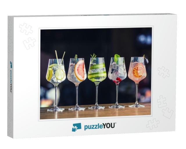 Five Colorful Gin Tonic Cocktails in Wine Glasses on Bar... Jigsaw Puzzle