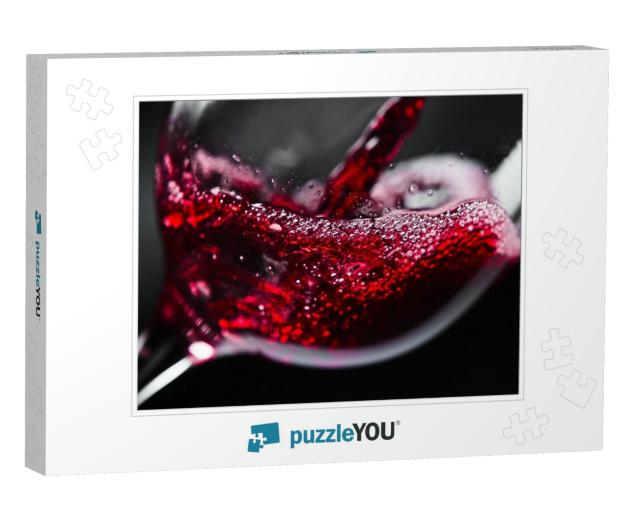 Red Wine in Wineglass on Black Background... Jigsaw Puzzle