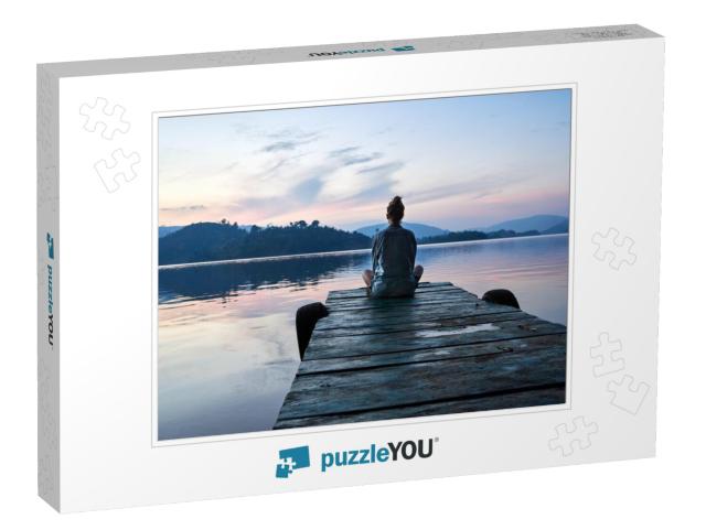 Peaceful Lifestyle Shot of Woman Sitting on Dock At Sunse... Jigsaw Puzzle