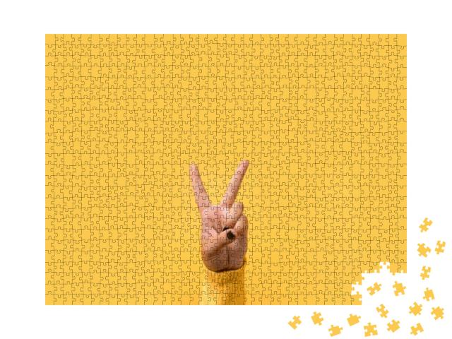 Hand Gesture V Sign for Victory or Peace Sign Over Yellow... Jigsaw Puzzle with 1000 pieces